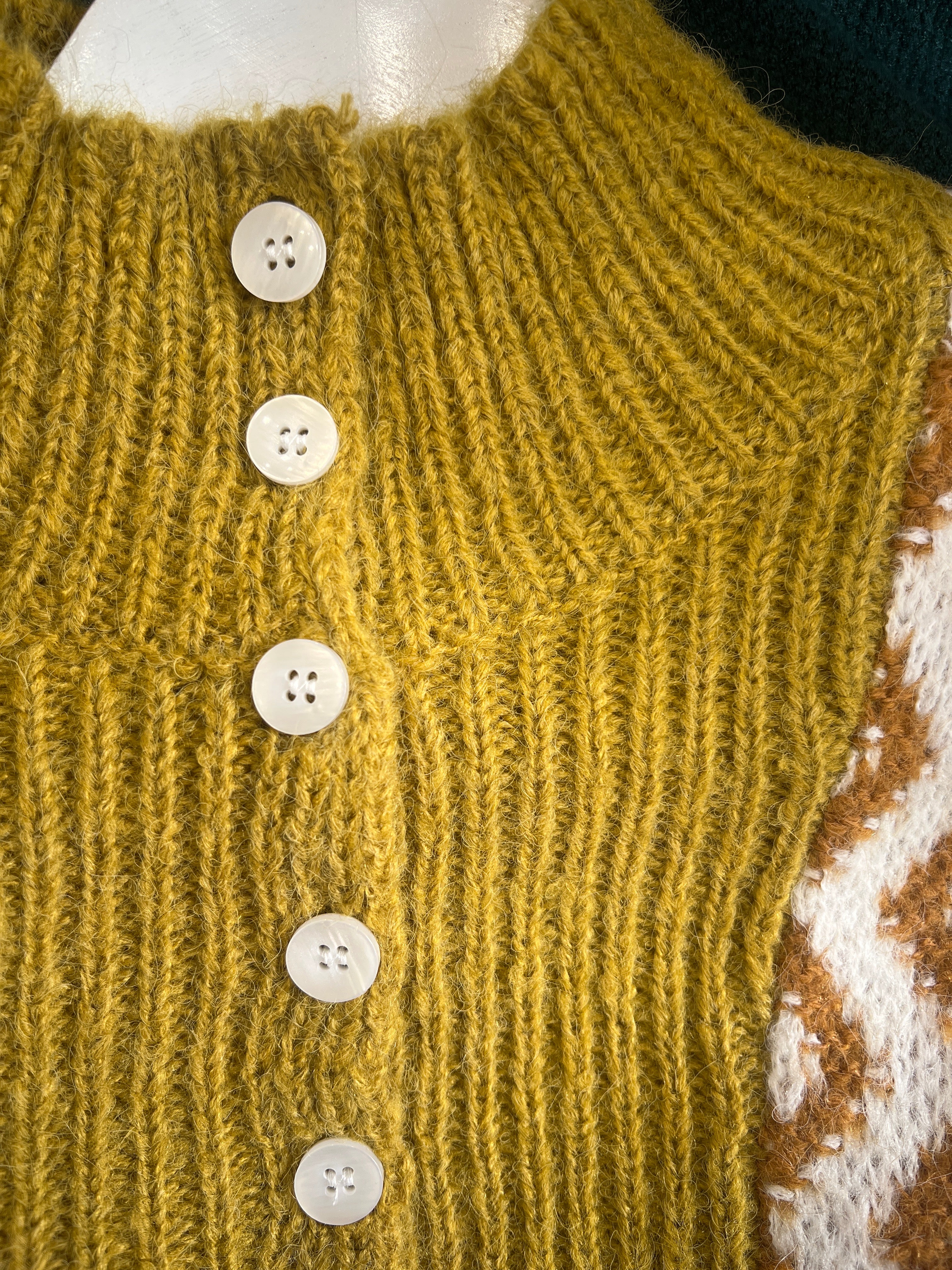 Jersey lana cuello con botones