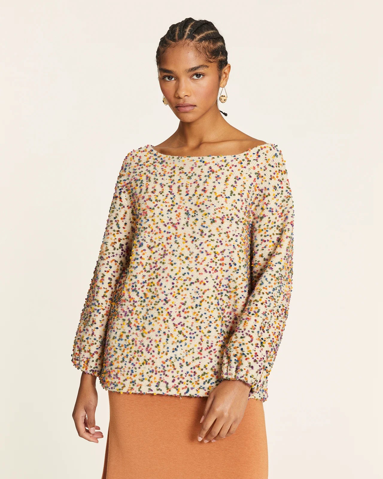 Jersey punto mini pompones crudo