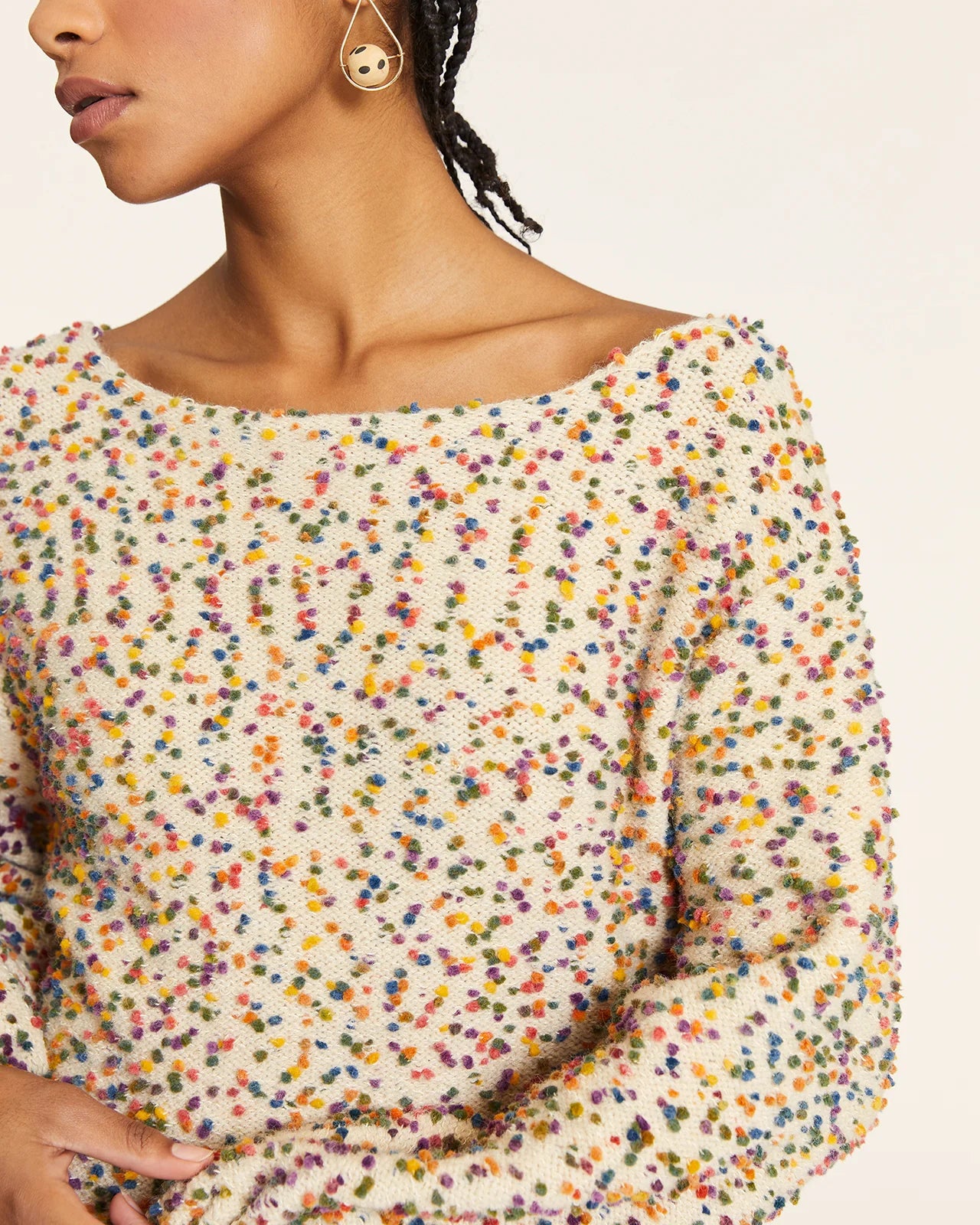 Jersey punto mini pompones crudo