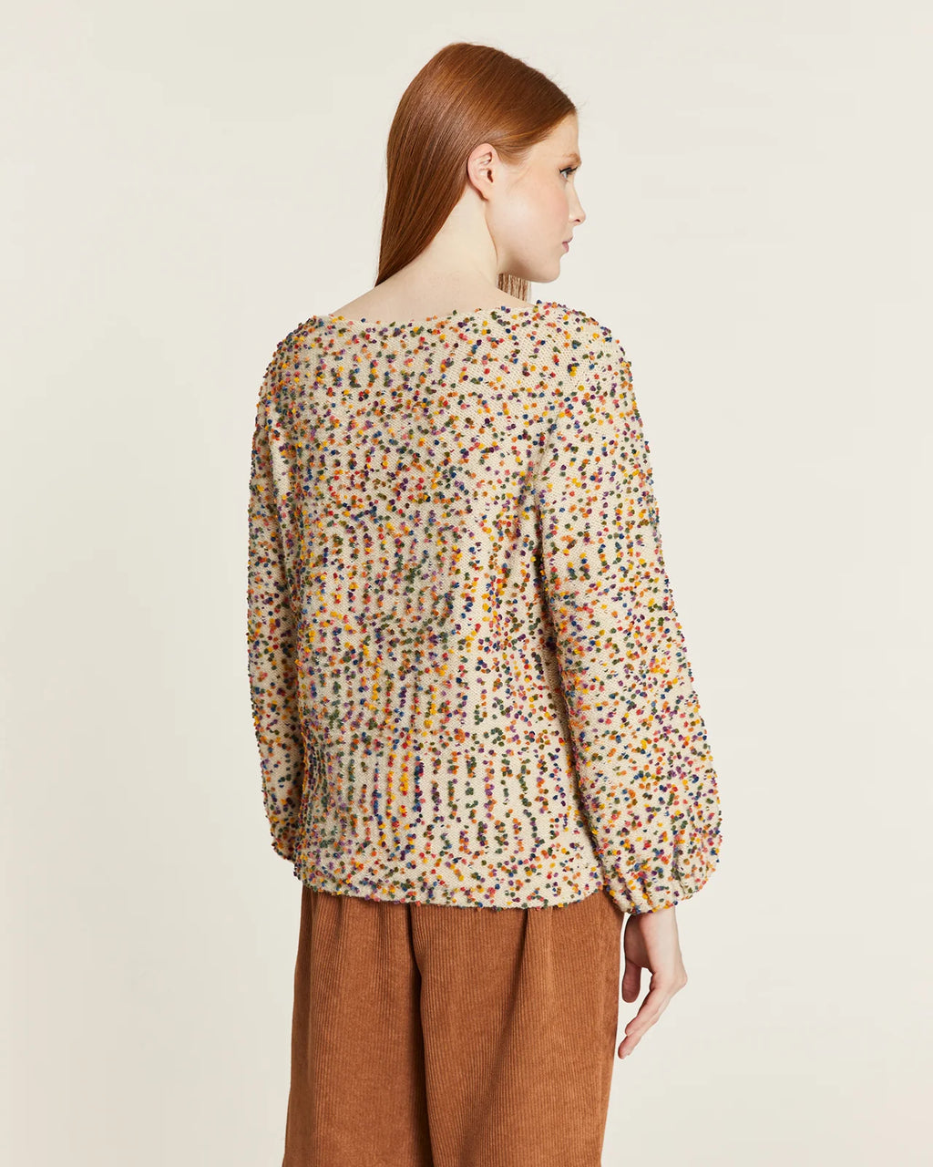 Jersey punto mini pompones crudo