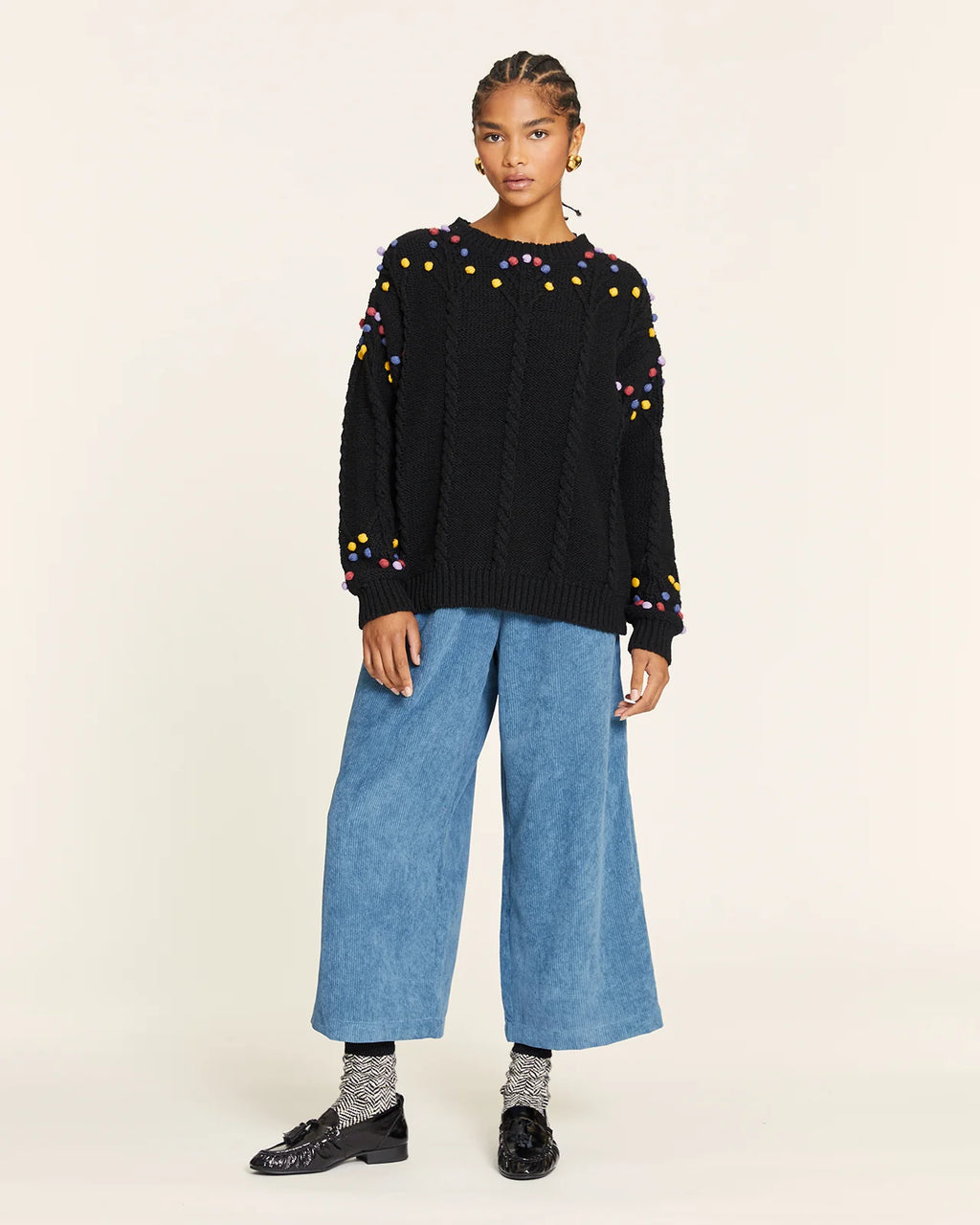 Jersey pompón trenzado negro