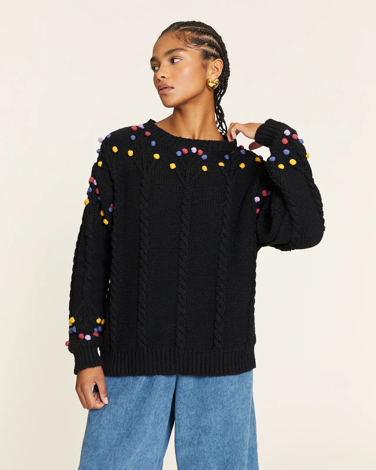 Jersey pompón trenzado negro