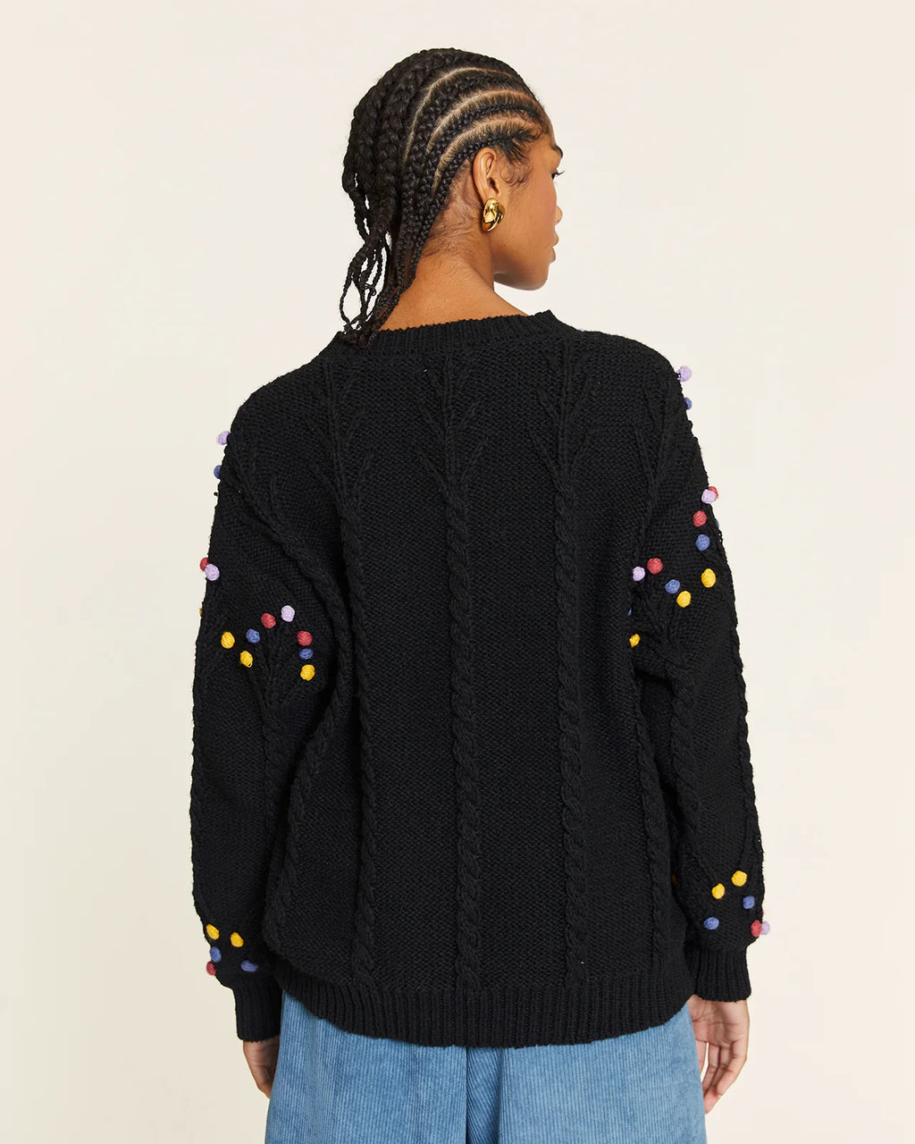 Jersey pompón trenzado negro